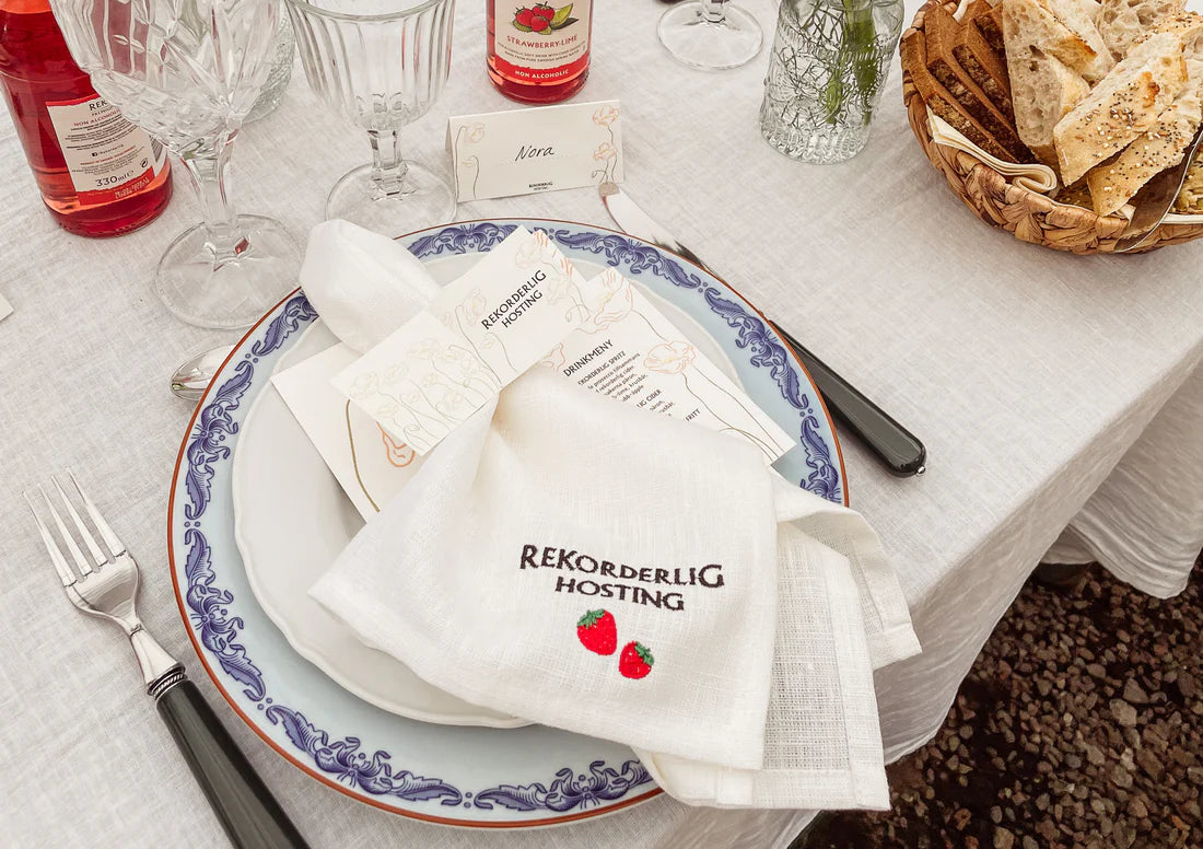 Broderad logotyp på servetter